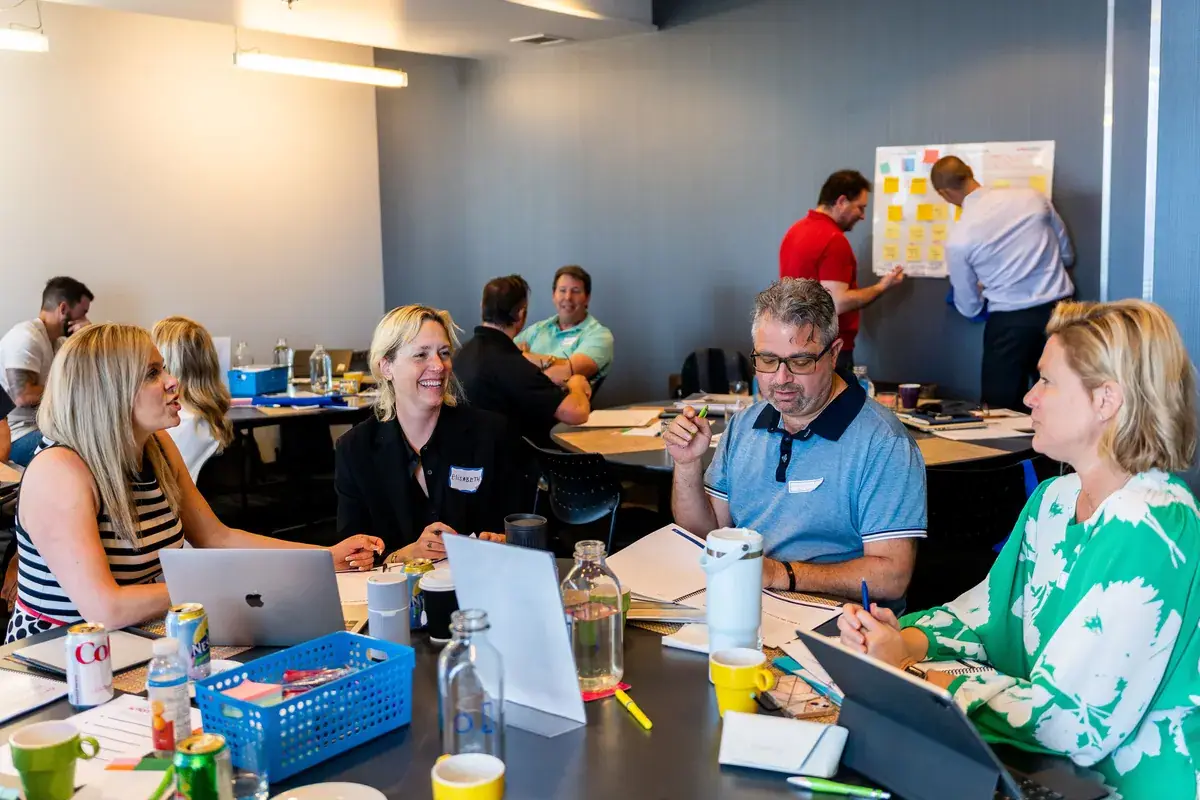 Business owners working together at a coaching workshop