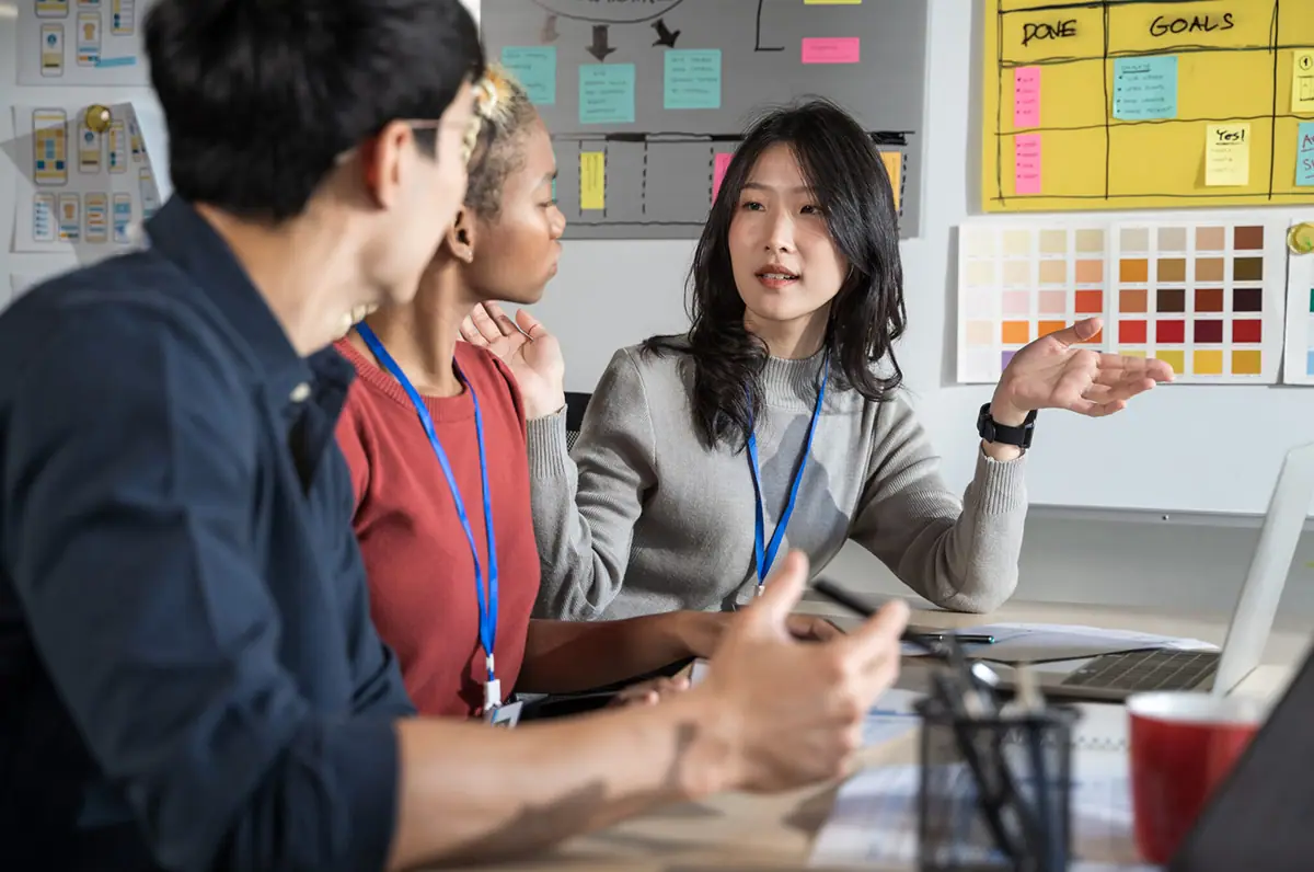 A business coach in a working session with business owners
