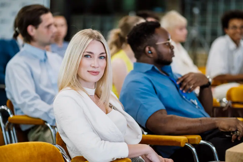 Business owners listening together at a group coaching session